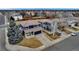 Two adjacent homes featuring ample parking and outdoor spaces within a suburban neighborhood at 4539 Lyndenwood Cir, Highlands Ranch, CO 80130