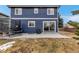 Open backyard with a concrete patio, trampoline, and lush green space at 4539 Lyndenwood Cir, Highlands Ranch, CO 80130