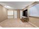 Spacious finished basement with recessed lighting, neutral carpet, and two white doors at 4539 Lyndenwood Cir, Highlands Ranch, CO 80130