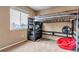 Bedroom with a rustic wooden bunkbed and a large window at 4539 Lyndenwood Cir, Highlands Ranch, CO 80130