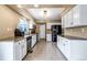 Functional kitchen with stainless steel appliances, granite countertops, and plenty of cabinet space at 4539 Lyndenwood Cir, Highlands Ranch, CO 80130