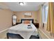 This bedroom features a queen sized bed, bedside tables, and neutral walls at 611 Winona Ct, Denver, CO 80204