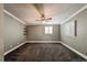 Spacious carpeted bedroom has crown molding, and bright windows at 241 N Grant St, Denver, CO 80203