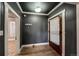 Warm and inviting entryway featuring hardwood floors, stylish gray walls, and natural light at 241 N Grant St, Denver, CO 80203