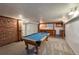 A game room featuring a pool table, carpeted floors and a wet bar at 241 N Grant St, Denver, CO 80203