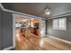 Spacious eat-in kitchen offers center island, hardwood floors, stainless appliances and eat-in bar at 241 N Grant St, Denver, CO 80203