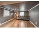 Living room has hardwood floors, large windows and a wood front door at 241 N Grant St, Denver, CO 80203