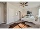 Comfortable bedroom featuring a ceiling fan, carpeted floor, and decor at 15530 W 64Th Pl # C, Arvada, CO 80007