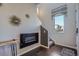 Stylish entryway with modern decor, hardwood floors and natural light from the window at 15530 W 64Th Pl # C, Arvada, CO 80007