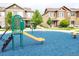 Community playground with slides and recreational equipment for outdoor activities at 15530 W 64Th Pl # C, Arvada, CO 80007