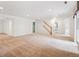 Large finished basement area with plush carpeting and natural light at 11237 W Ford Dr, Lakewood, CO 80226