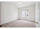 Empty bedroom with neutral carpet and natural light at 11237 W Ford Dr, Lakewood, CO 80226