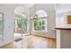 Dining Area with chandelier and sliding door access to the outside deck at 11237 W Ford Dr, Lakewood, CO 80226