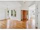 Inviting living room with hardwood floors, recessed lighting, and ample natural light at 11237 W Ford Dr, Lakewood, CO 80226