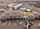 Aerial view of a modern residential neighborhood with landscaping and community amenities at 1039 Leonard Ln, Louisville, CO 80027