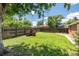 Spacious backyard featuring a brick grill and green lawn at 2635 Julian St, Denver, CO 80211