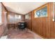 Versatile flex space with wood paneling and outdoor view at 2635 Julian St, Denver, CO 80211
