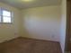 Cozy bedroom with a window allowing natural light to enter the room at 827 Hannibal Dr, Aurora, CO 80011