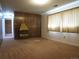 A bright living room with a fireplace, and a large window at 827 Hannibal Dr, Aurora, CO 80011