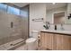 Modern bathroom with a glass-enclosed shower and contemporary fixtures at 3232 W 16 Ave, Denver, CO 80204