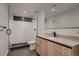 Contemporary bathroom with walk-in shower and sleek fixtures, offering a modern and functional space at 3232 W 16 Ave, Denver, CO 80204
