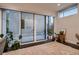 Bright living room showcasing sliding glass doors to the back and a cozy, patterned rug at 3232 W 16 Ave, Denver, CO 80204