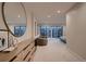 Spacious main bedroom features large windows and walkout balcony, offering a serene and bright living space at 3232 W 16 Ave, Denver, CO 80204