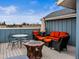 Outdoor patio features ample seating, fire pit, and an umbrella providing a relaxing space at 6162 W 28Th Ct, Wheat Ridge, CO 80214
