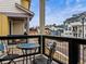 Outdoor balcony with a seating area and views of the neighborhood at 6162 W 28Th Ct, Wheat Ridge, CO 80214