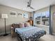 Comfortable bedroom with pull out sofa, ample natural light, and neutral tones at 6162 W 28Th Ct, Wheat Ridge, CO 80214