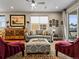 Stylish living room with hardwood floors, modern decor, and access to an outdoor balcony at 6162 W 28Th Ct, Wheat Ridge, CO 80214