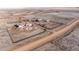 Aerial view of expansive property featuring a circular driveway and countryside views at 7172 S Oakleaf St, Bennett, CO 80102
