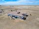 Expansive aerial view of this single-story home boasts open land, privacy, and a circular driveway at 7172 S Oakleaf St, Bennett, CO 80102