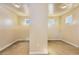 Blank canvas basement ready for your design, with carpet and egress windows at 7172 S Oakleaf St, Bennett, CO 80102