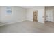 Spacious bedroom with light wood floors, ensuite bathroom and bright natural light at 2329 Lakeshore Ln # 14, Superior, CO 80027
