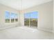 Bright dining area with large windows, contemporary lighting, and beautiful light wood flooring at 2329 Lakeshore Ln # 14, Superior, CO 80027