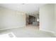 Bright open-concept living room featuring modern light fixture and access to the kitchen at 2329 Lakeshore Ln # 14, Superior, CO 80027