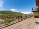 Expansive deck with scenic views, perfect for enjoying the outdoors at 24170 Matterhorn Dr, Indian Hills, CO 80454