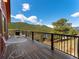 Deck offers scenic views of mountains and blue sky at 24170 Matterhorn Dr, Indian Hills, CO 80454