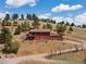 Exterior of home with view of surrounding landscape at 24170 Matterhorn Dr, Indian Hills, CO 80454
