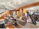 Bright living room with a comfortable seating area and adjacent spaces at 24170 Matterhorn Dr, Indian Hills, CO 80454