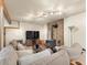 Comfortable living room with a fireplace and a television with lots of seating at 24170 Matterhorn Dr, Indian Hills, CO 80454