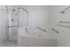 Bright bathroom featuring a glass shower and relaxing soaking tub at 4428 S Kalispell Cir, Aurora, CO 80015