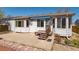 Back patio with a small deck at 4428 S Kalispell Cir, Aurora, CO 80015