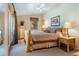 Cozy bedroom with a log bed frame, a wooden dresser, and natural light, offering a rustic and comfortable retreat at 189 Ginger Quill Ln, Breckenridge, CO 80424
