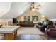 Expansive living room with vaulted ceilings, comfortable seating, and natural light, ideal for relaxation and socializing at 189 Ginger Quill Ln, Breckenridge, CO 80424
