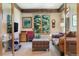 Comfortable living room featuring natural light, plush seating, and nature views at 189 Ginger Quill Ln, Breckenridge, CO 80424