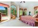 Bright main bedroom with vaulted ceilings, large windows with mountain views, and a private balcony at 189 Ginger Quill Ln, Breckenridge, CO 80424