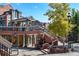 Charming brick retail building with outdoor stairs and decorative architectural details at 189 Ginger Quill Ln, Breckenridge, CO 80424