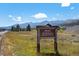 Welcome to Breckenridge sign with a mountain backdrop under a sunny sky at 189 Ginger Quill Ln, Breckenridge, CO 80424